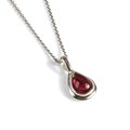Click to view product details and reviews for Classic Teardrop Necklace In Silver And Garnet 20 50cm.