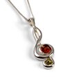 Click to view product details and reviews for Musical Treble Clef Necklace In Silver And Amber 16 40cm.