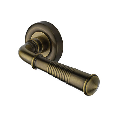 Heritage Brass Reeded Colonial Design Door Handles On Round Rose, Antique Brass - V1936-AT (sold in pairs) ANTIQUE BRASS