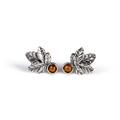 Click to view product details and reviews for Sycamore Leaf Stud Earrings In Silver And Amber Cognac.