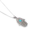 Click to view product details and reviews for Hamsa Hand Necklace In Silver And Turquoise 22 56cm.
