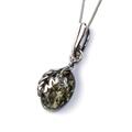 Click to view product details and reviews for Oak Leaf Necklace In Silver And Green Amber 16 42cm.