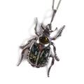 Click to view product details and reviews for Noble Chafer Beetle Necklace In Silver And Green Amber 16 42cm.