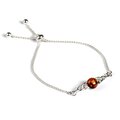Click to view product details and reviews for Celtic Style Adjustable Friendship Bracelet In Silver And Amber Green.