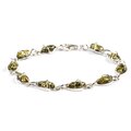 Click to view product details and reviews for Elegant Twist Bracelet In Silver And Green Amber Cognac.