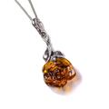 Click to view product details and reviews for Rose Necklace In Silver And Cognac Amber 16 42cm.