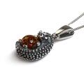 Click to view product details and reviews for Hedgehog Necklace In Silver And Cognac Amber 16 42cm.