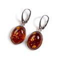 Click to view product details and reviews for Tranquil Oval Drop Earrings In Silver And Amber Cognac.