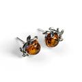 Click to view product details and reviews for Leaf Motif Stud Earrings In Silver And Amber Cognac.