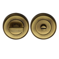 Heritage Brass Round 50mm Diameter Turn & Release, Antique Brass - V4040-AT ANTIQUE BRASS