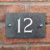 Image of Slate house number 12 v-carved with white infill number