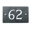 Image of Slate house number 62 v-carved with white infill numbers