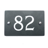 Image of Slate house number 82 v-carved with white infill numbers