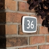 Image of Rectangle house number in matt white ceramic with choice of coloured background