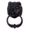 Image of Black iron lion door knocker