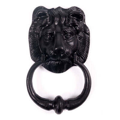 Black iron lion door knocker