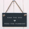 Image of Kiss the dog, and feed the husband - slate hanging sign