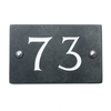 Image of Slate house number 73 v-carved with white infill numbers