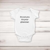 It’s Not You It’s Your Grammar Babygrow – White, 6-12 Months