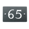 Image of Slate house number 65 v-carved with white infill numbers