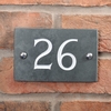 Image of Slate house number 26 v-carved with white infill numbers