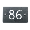 Image of Slate house number 86 v-carved with white infill numbers