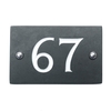Image of Slate house number 67 v-carved with white infill numbers