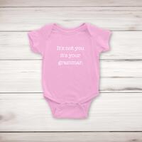 It’s Not You It’s Your Grammar Babygrow – Pink, 3-6 Months
