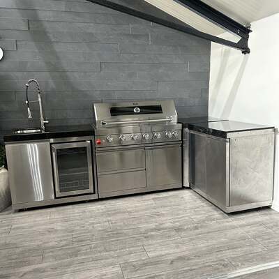 Ex Display Draco Grills 6 Burner Stainless Steel Outdoor Kitchen with Double Cupboard, Sink and Fridge unit and 90 Degree Corner Unit