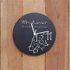 Image of Round Slate Clock with funky design sandblasted and hand painted
