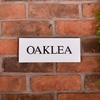 Image of Granite House Sign 25.5 x 10cm 1 Line with sandblasted and painted background