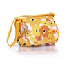 Okiedog Genie Flower Power Changing Bag Orange/Yellow from Daisy Baby Shop