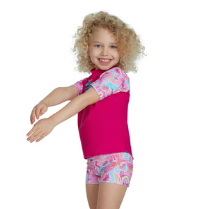 Dive into a World of Magic with the Speedo Girls Short Sleeve Printed Rash Top Set