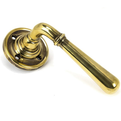 From The Anvil Newbury Door Handles On Round Rose, Aged Brass - 91418 (sold in pairs) AGED BRASS - UNSPRUNG
