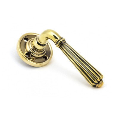 From The Anvil Hinton Door Handles On Round Rose, Aged Brass - 45309 (sold in pairs) AGED BRASS - SPRUNG