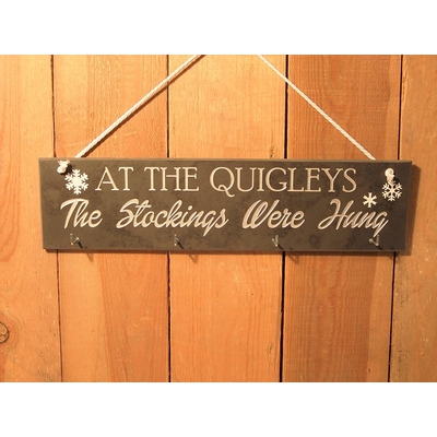Personalised slate stocking hanger engraved with your family name and "the stockings were hung"