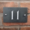 Image of Slate house number 11 v-carved with white infill number