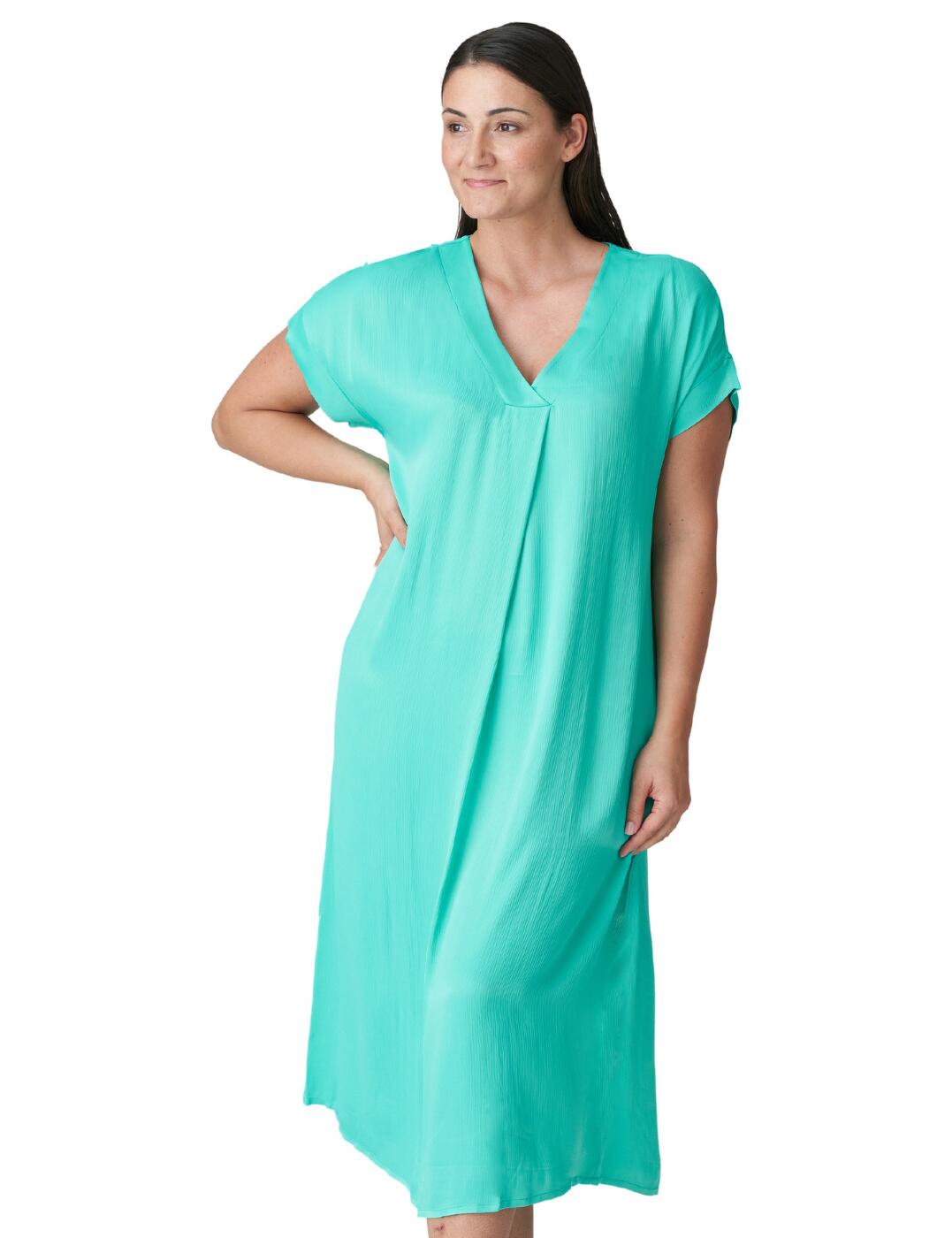 Indulge yourself in the epitome of beachside elegance with the Prima Donna Marival beach cover up. This fabulous creation is designed specifically for the trendy and sophisticated women who crave nothing less than absolute luxury during their seaside getaways. The mid shin length ensures just the right amount of coverage, allowing you to exude grace and sophistication while staying comfortable. Designed with short sleeves, it offers a perfect balance between sun-kissed chic and sun protection, keeping you cool and breezy throughout the day. Matching swimwear is available for a gorgeous finished look.