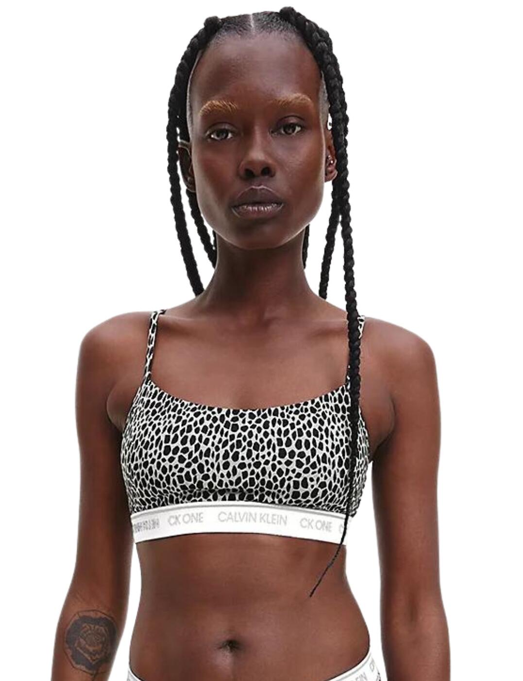 A staunch design made with comfort in mind from CK One by Calvin Klein. The bralette is made from super soft material with adjustable string straps, no padding or underwire. The back is open for a different take on an everyday look, finished off with the classic CK One elastic underband.  Cotton modal jersey material Unlined, no padding Adjustable shoulder straps Open back design, pulls on Calvin Klein signature elastic underband Care instructions: Machine wash, do not tumble dry Composition: 55% cotton &pipe; 37% modal &pipe; 8% elastane Listed in UK sizes  56950-100775-1308191 000QF5727E  Unlined Bralette
