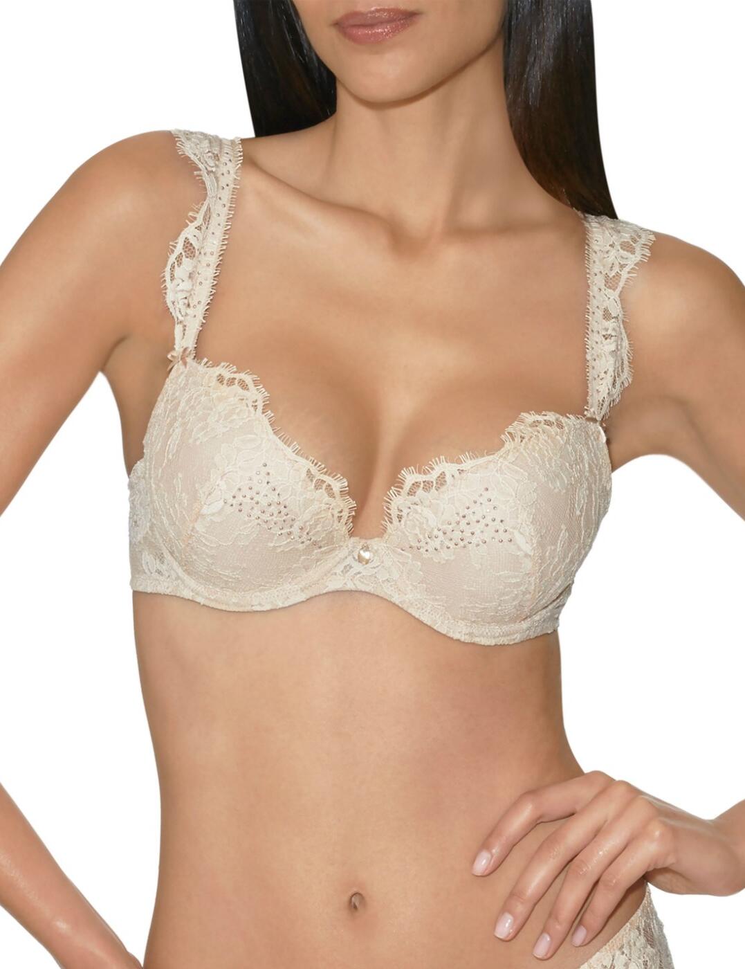 Oozing seductive vibes, the Precious Glow Moulded Plunge Bra from Aubade offers a truly sexy and striking addition to your intimate lingerie collection. Focusing on the plunging neckline, this bejewelled bra is a truly dazzling piece. Beautifully adorned with crystals for a luxurious touch, with shooting stars across the cups and adorning the straps, and a crystal in the middle. Padded for lift and shape, and underwired for support. Adjustable straps with hook and eye fastening to rear.  Crystals to cups and straps Plunge neckline Padded Underwired Adjustable straps Hook and eye fastening to the rear Listed in UK sizes   34583-63730-840666 EH08 Moulded Plunge Bra