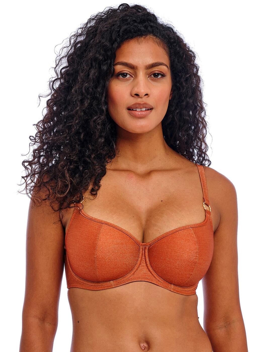 Turn heads at the beach with the Arizona Wave sweetheart bikini top by Freya. Featuring a supportive underwire and lightly padded foam cups, this must-have bikini top enhances your natural silhouette with smooth, round shape for an eye-catching holiday look. The sweetheart neckline exudes flirtatious feminine charm, while metallic yarn in the fabric adds a hint of glamour to your swimwear ensemble. Bamboo ring details lend an exotic touch, perfect for strolling down the sand or relaxing by the pool. Plus, with fully adjustable straps and a secure plastic clasp closure, this bikini top promises comfort and versatility. Coordinate with matching pieces from the Arizona Wave collection to curate your ultimate poolside look.