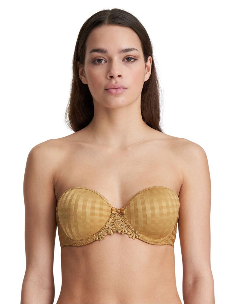 Update your lingerie collection with this Avero strapless bra from Marie Jo. Featuring smooth padded cups creating a gorgeous rounded shape. Adjustable straps ensure a unique fit and can be removed for a strapless look, you can also wear them in a halterneck style for a stylish look. The back features a silicone band to make sure the bra stays in place throughout the day. Underwire and the hook and eye closure to the back provide support all day. Perfectly blending the signature checkered pattern with the embroidered detailing for feminine stylish look. Pair with matching items to complete the look.  Smooth padded cups Adjustable detachable straps Silicone band in the back Underwired Hook and eye closure Checkered pattern Embroidered detail Composition: 49% Polyamide &pipe; 41% Polyester &pipe; 10% Elastane Listed in UK sizes  51009-92251-1211187 0200413 Strapless bra