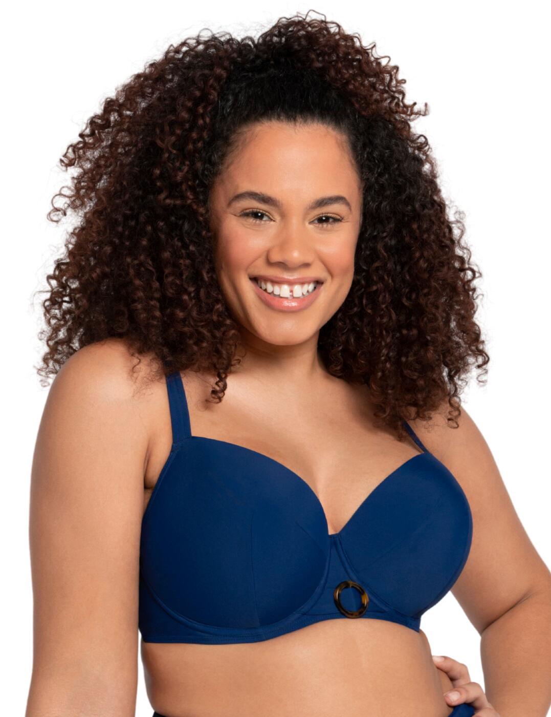 Looking for supportive and stylish swimwear? The Curvy Kate Retro Sun padded balcony bikini top is just that. This bikini top features foam padded cups, for excellent support and lifting of the breasts. The plunging neckline accentuates the cleavage while the round cups support the breasts. The soft, breathable material is ideal for enjoying the sun or lounging by the pool. The thick underband provides extra support and has an added detail for a more unique style. The straps are fully adjustable and can be worn normally or transformed into a racerback. The back of the bikini is fastened with a clip, making it very easy to put on and take off.  Padded bikini top Plunging neckline Soft, breathable material Supportive thick underband Added detail Adjustable straps Racerback option Composition: Mixed fabric contents Listed in UK sizes  51237-92486-1214210 CS019300 Balcony Bikini Top