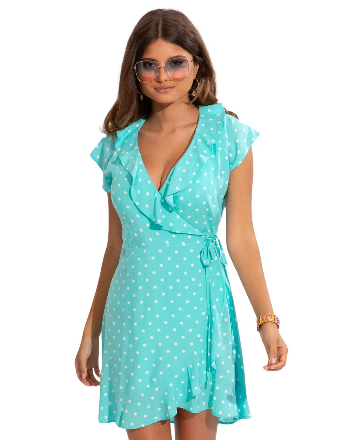 Pour Moi creates this stunning piece, a wrap beach dress, a beautiful and oh-so-fashionable addition to your beach wardrobe. With its short sleeves and mid thigh length, this dress is the perfect combination of comfort and style. The plunging neckline adds a touch of allure. And let's not forget the tie side, an elegant detail that allows you to adjust the dress to your perfect fit. But what truly sets this wrap beach dress apart is the flattering frills. These delicate details add a feminine flair to the dress, creating a lovely silhouette that accentuates your curves in all the right places. So ladies, if you're seeking swimwear that combines style and functionality, look no further than the Pour Moi wrap beach dress.