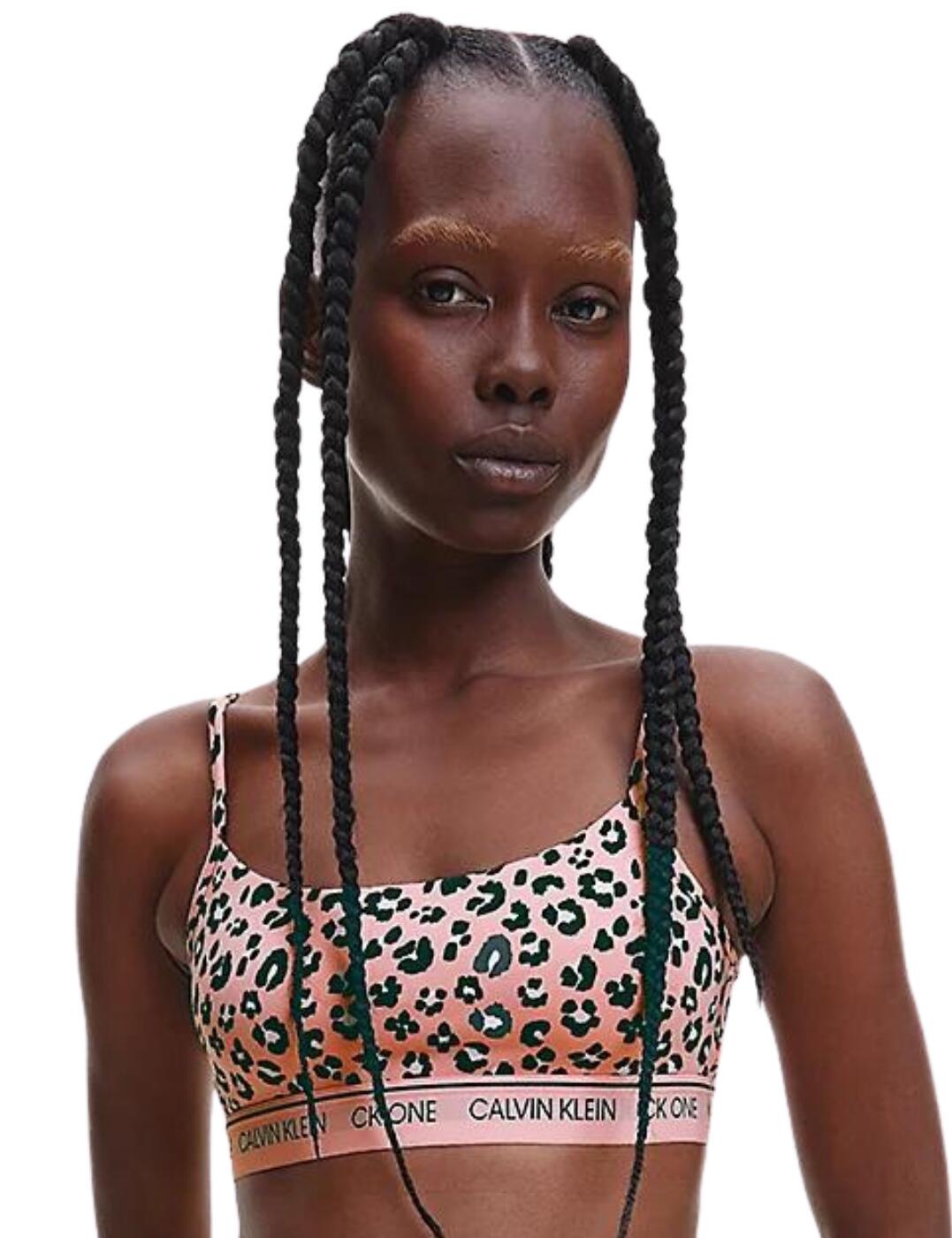 This unlined bralette is by Calvin Klein and is a part of the CK One Cotton range that creates timeless pieces with all day-comfort and classic Clavin Klein branding. The bralette is unlined with non-padding cups creating a natural shape and fit and providing full coverage. It has a sexy open-back design that is a pull-on style for easy wear. The under band is elastic and features the signature, Calvin Klein branding. This bralette is covered in a trendy print which is perfect for summer.  Unlined bralette Comfortable fit Non-padded Full coverage Sexy open-back Pull-on style Elastic Calvin Klein under band Covered in a trendy print perfect for summer Country of Origin:- Sri Lanka Composition:- 55% Cotton &pipe; 37% Modal &pipe; 8% Elastane Listed in UK sizes  54132-96848-1280457 000QF5727E  Bralette