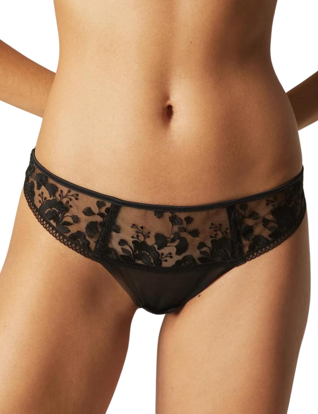 Show off your impeccable style with these tanga briefs from the gorgeous retro-inspired Orphee collection by Simone Perele. The minimalistic design with the cheeky revealing rear coverage and traditional mid-rise waist is sure to accentuate your curves, while not interfering with your everyday comfort. The tulle back is made so that your underwear will remain invisible under clothing. The front of these briefs is decorated with a captivating sheer mesh panel adorned with floral embroidery. The satin waistband and front trims finish off this elegant look.