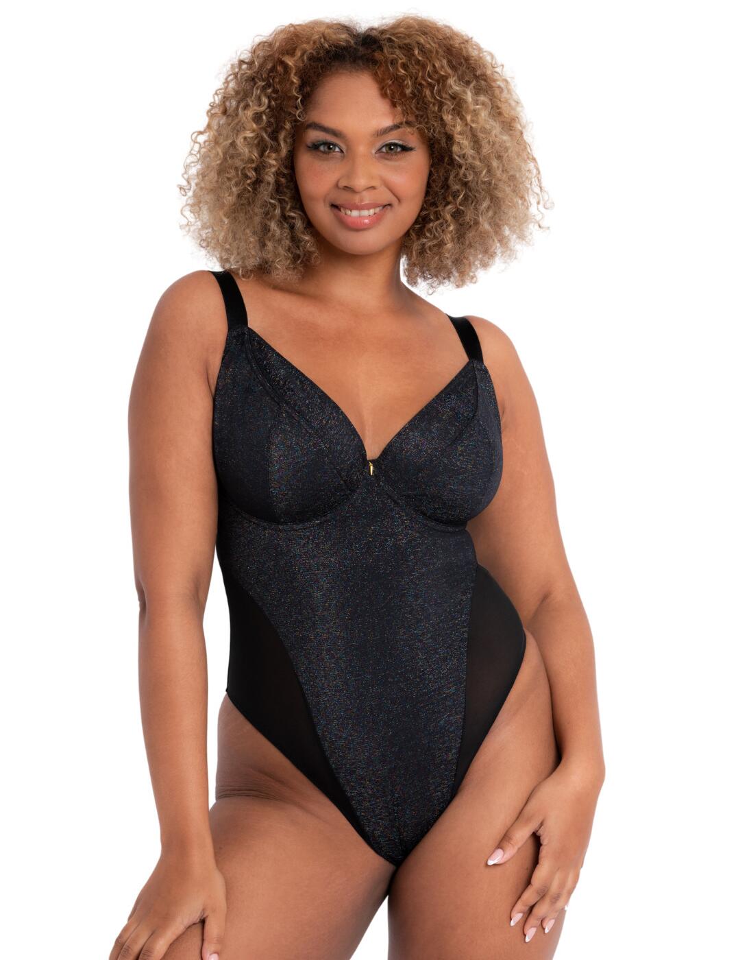 Get hearts racing in the All Night plunge body by Curvy Kate. The blend of opaque and sheer fabric complements your body and gives you a seductive appearance. The overall shimmering fabric glistens as you move, while a sheer mesh back highlights your feminine shape. Power mesh lines the cups giving you additional support and superior comfort. Underwiring supports and lifts your bust which is highlighted by the plunging neckline. A contrasting charm dangles between the cups giving this piece a pop of colour. The high-leg style gives you the appearance of elongated legs. Cheeky bikini-style rear coverage highlights your curves and gives you an alluring look. Gusset fastening for a smooth silhouette and comfortable fit.  Plunging underwired cups lined with powermesh Adjustable shoulder straps and hook and eye closure for the perfect fit High-leg cut Bikini style rear coverage Country of origin: China Composition: Main: 72% Polyamide &pipe; 12% Metallised Fibre &pipe;16% Elastane Composition: Lining: 100% Polyamide Composition: Wing Mesh: 73% Polyamide &pipe; 27% Elastane Composition: Brief Mesh: 92% Polyamide &pipe; 8% Elastane Composition: Gusset Liner: 100% Cotton Listed in UK sizes  55540-99001-1281815 CK048704 Body