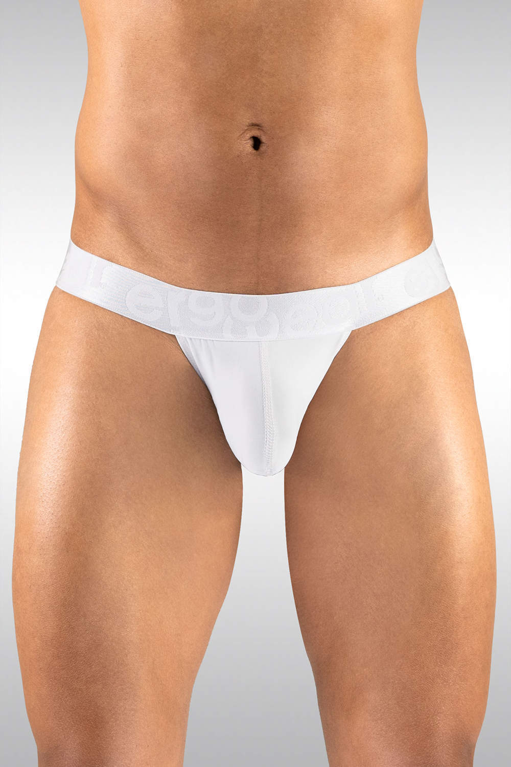 Combining men's thong underwear and a tanga brief this enhancing string slip for men is silky and sexy. International shipping. Plain parcels. Buy now