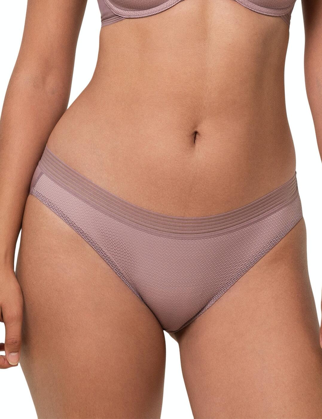 Allow the Infinite Sensation range to become your new go-to for everyday lingerie. These Tai briefs feature a comfortable mid-rise waist and moderate rear coverage. A breathable material with a smooth finish on the back allows you to wear this piece even with a tight-fitting outfit without the scare of visible panty lines. The front of these briefs is decorated with a cheeky mesh fabric. An elasticated waistband is made in a trendy stripy pattern, finishing the look beautifully. Match with coordinating items from the Infinite Sensation collection for a full effect.  Breathable material Netted mesh on the front No-VPL seamless back Stripy elastic waistband Lined gusset Mid-rise waist Moderate rear coverage Country of origin: Vietnam Composition: 81% Polyamide &pipe; 19% Elastane Listed in UK sizes  59674-104419-1405012 10189946 (3900) Brief