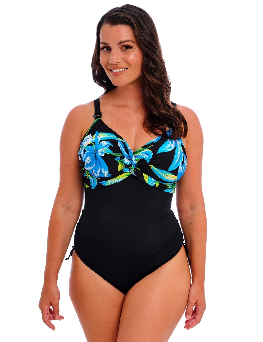 You're sure to be hitting the beach in style this season with Fantasie's Talm Beach twist-front swimsuit! This classic swimsuit is dripping in modern flair thanks to the vibrant tropical print adorning the non-padded, underwired cups and stylish V-neckline. It features tie sides to give you full control of your look through an adjustable body length and custom leg line to personalise your coverage and maximise tanning potential! The modesty offered by the good rear coverage ensures you feel secure with every wear. What's more, full lining for your comfort and adjustable shoulder straps for that 'just right' fit will have you reaching for this swimsuit again and again! For a perfect poolside look, shop the matching sarong from the Talm Beach range - also available now.
